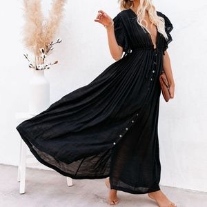 The Anika Pocketed Button Down Ruffle Maxi Dress